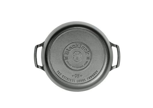 Bottom of dutch oven featuring Blacklock logo.