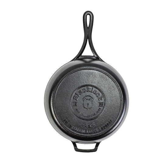 Bottom view of skillet featuring the Blacklock signature logo.