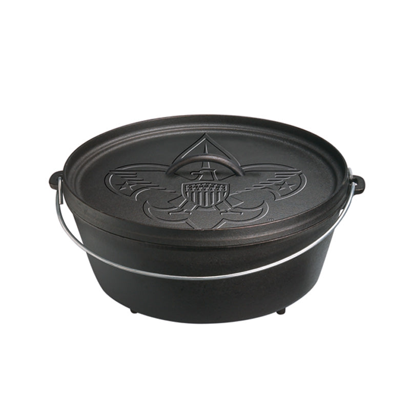 Black dutch oven with a boy scout design on lid.