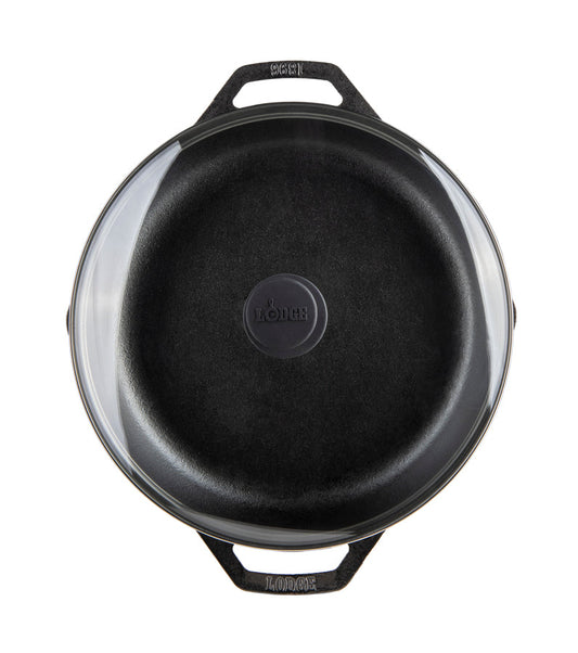 Top view of pan and lid featuring black handle knob in center of lid.