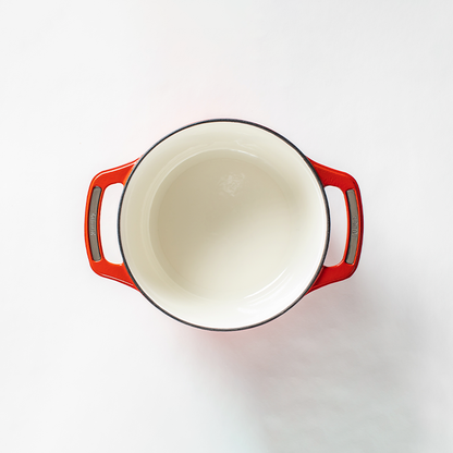 Inside of dutch oven, with a white enameled interior.