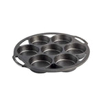 Circular pan with 7 cake cups and 2 handles.
