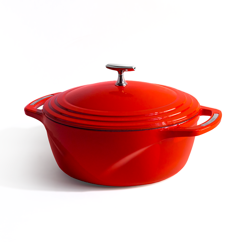 Red enameled cast iron Dutch oven with a lid on a white background