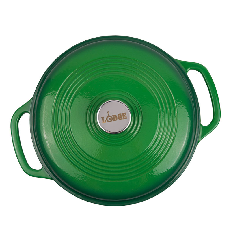 Top view of lid featuring silver knob with Lodge branding.