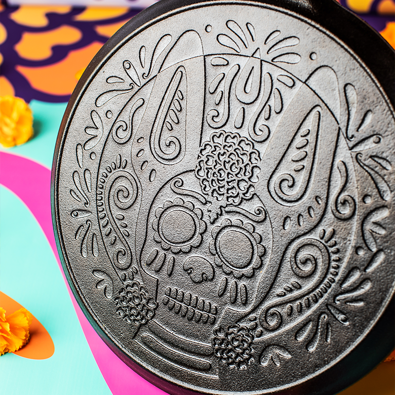 Close-up of engraved design on back of griddle.