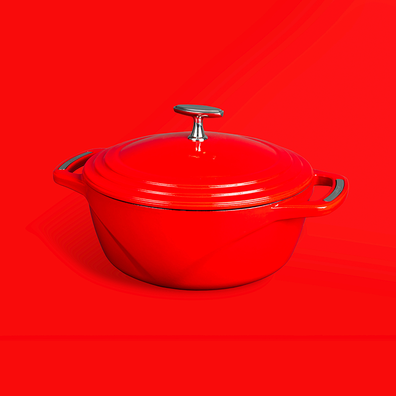 Red dutch oven on red background.