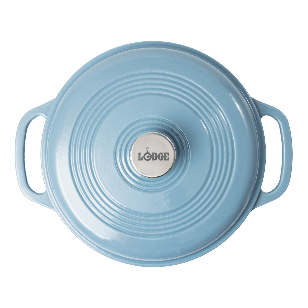 A blue Lodge cast iron Dutch oven shown from a top-down view, featuring a circular lid with concentric ridges, two side handles, and a silver-colored center knob with the Lodge logo.