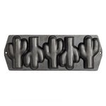 Cast iron baking pan with 5 cactus shaped molds.