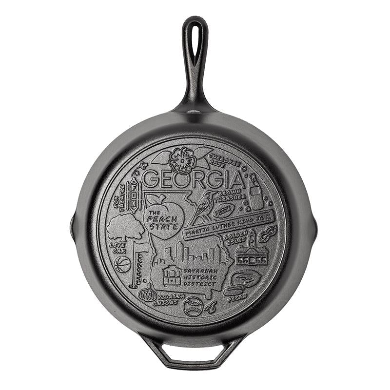Cast iron skillet with the bottom engraved with beloved icons and monuments from Georgia.