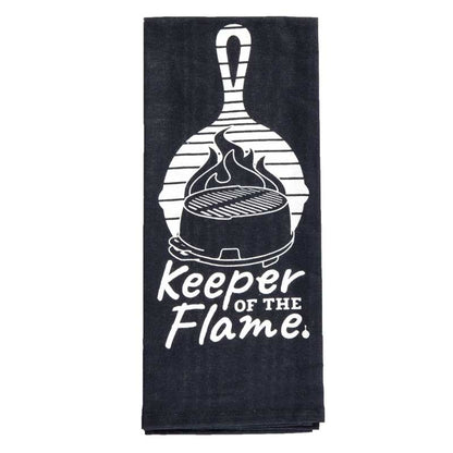 Black towel with a white grill and skillet graphic and 'Keeper of the Flame' white text.