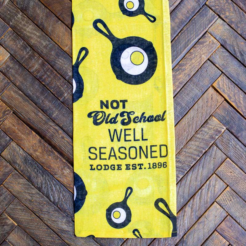 Towel on wooden counter.