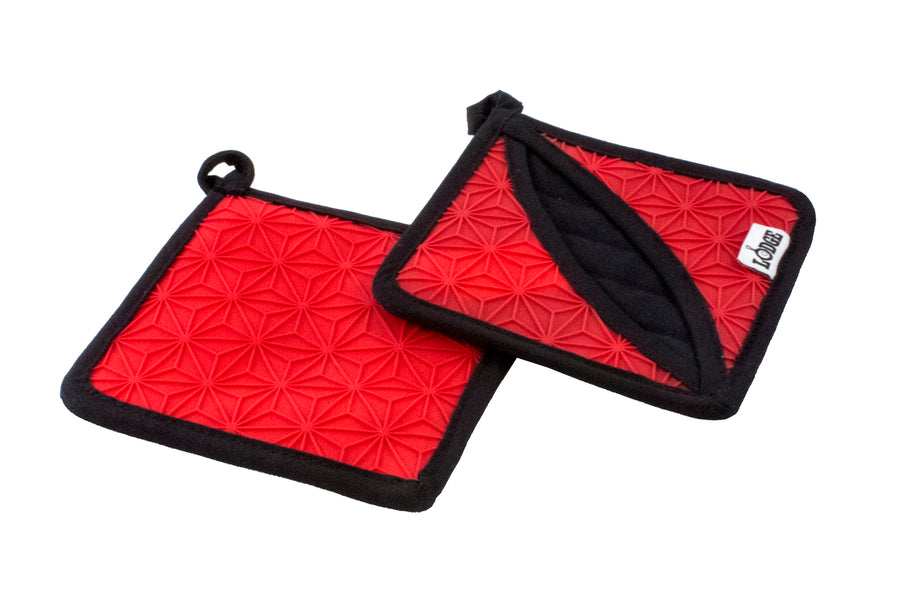 A view of the front and back of red pot holders with black borders on a white background