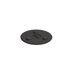 Black circular trivet with small bumps for magnets.