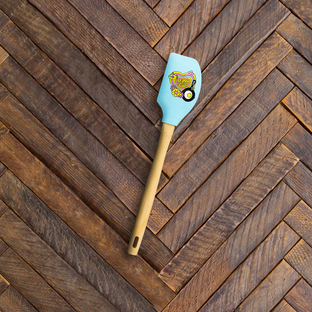 Spatula on a wooden counter.