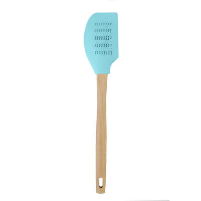 Back of spatula featuring a measurement conversion chart on the back.