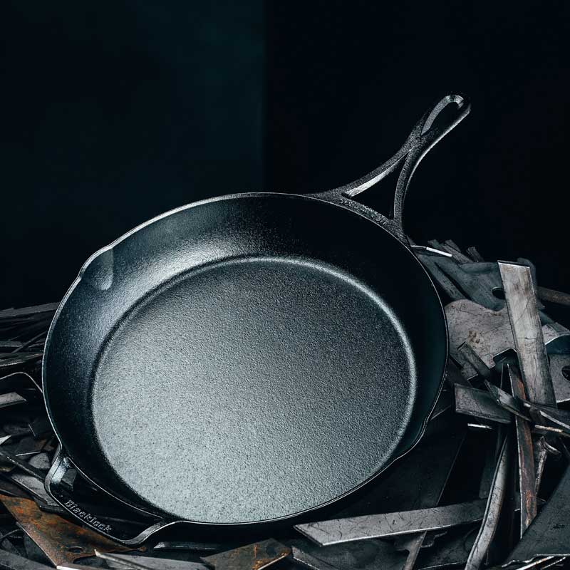 12 inch skillet on a black background.