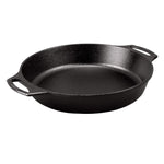 Black cast iron circular skillet with 2 loop handles.