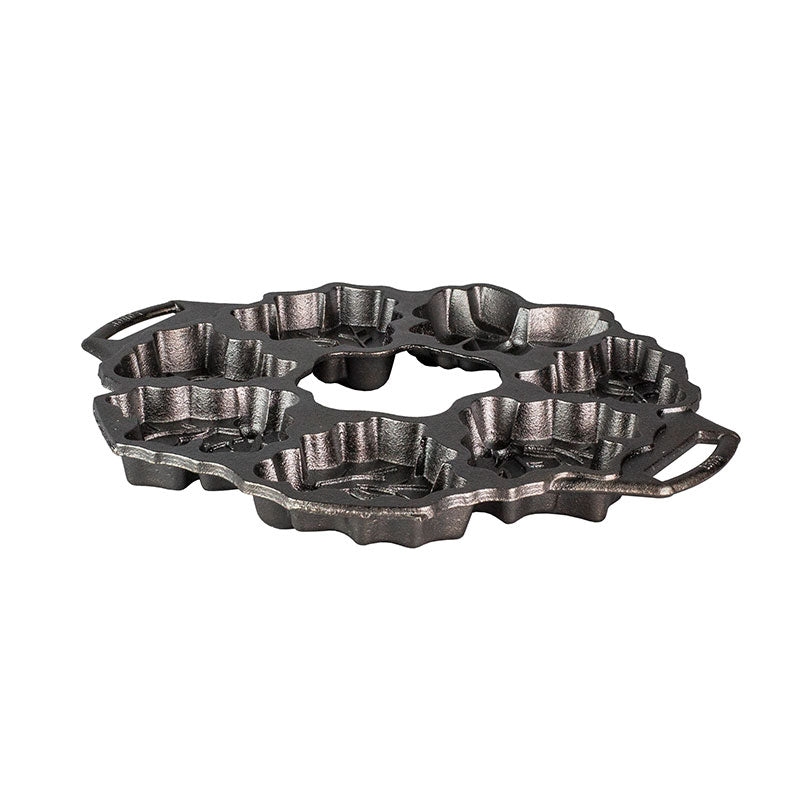 Mini cake pan with holiday themed designs that you can arrange to shape like a holiday wreath.