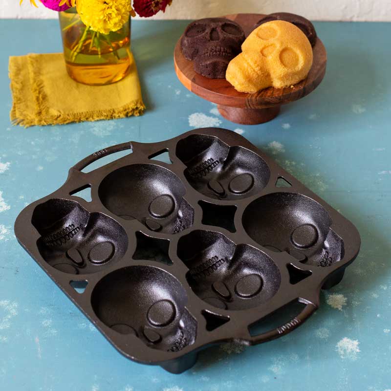 Pan on counter after being used to bake vanilla and chocolate cakes.