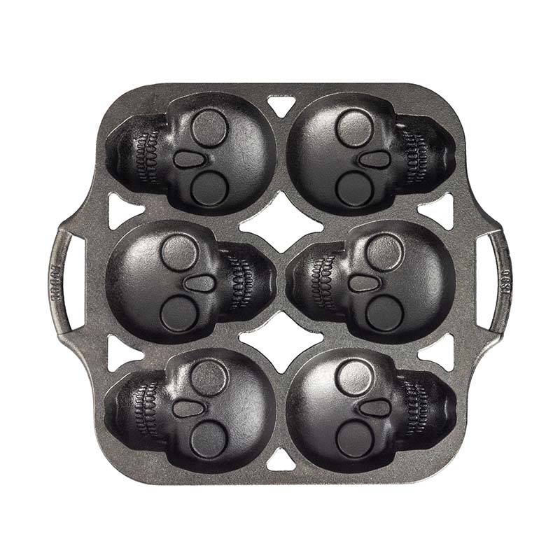 Mini cake pan with 6 skull shaped cups.