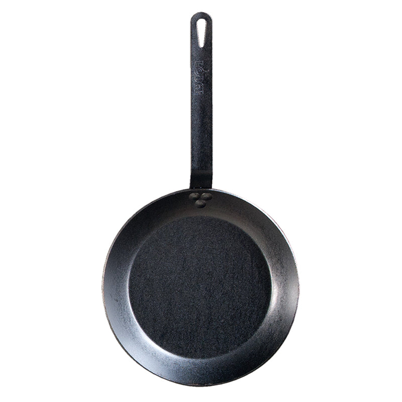 Top view of skillet showing cooking surface and Lodge branding on handle.
