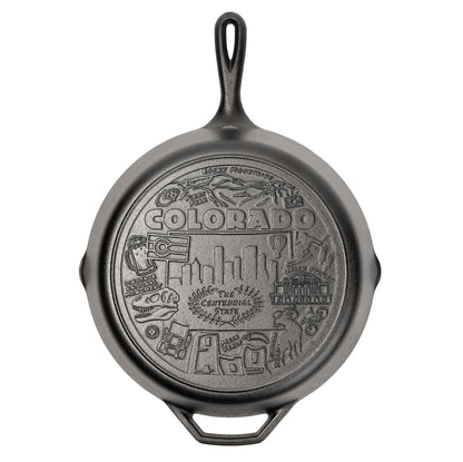 Cast iron skillet with the bottom engraved with beloved icons and monuments from Colorado.