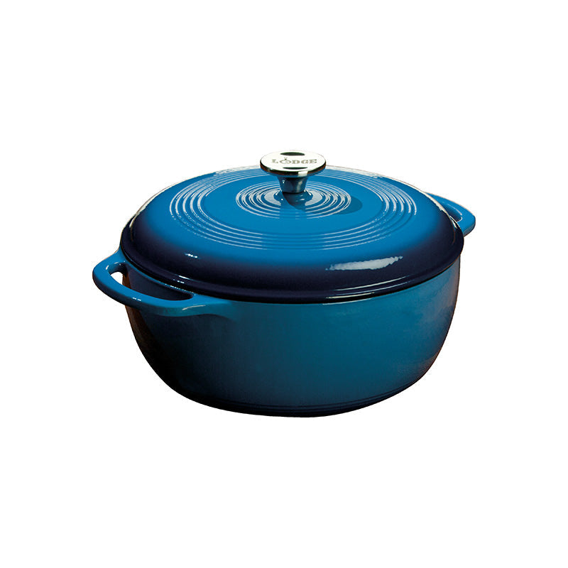 Blue gradient enameled cast iron Dutch oven with lid, both pieces have light blue on top and darken towards the bottom.