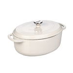 White oval enameled cast iron cookware with lid on a white background