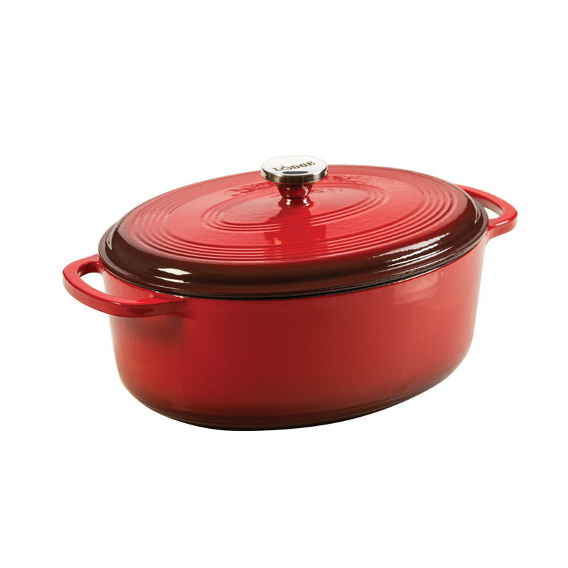 White oval enameled cast iron cookware with lid on a white background