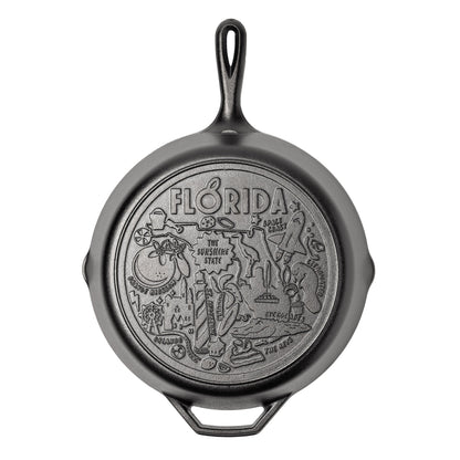 Cast iron skillet with the bottom engraved with beloved icons and monuments from Florida.