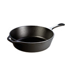 A deep, circular skillet with a long handle and loop handle.