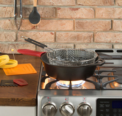 Fry basket being used in deep skillet on stove.