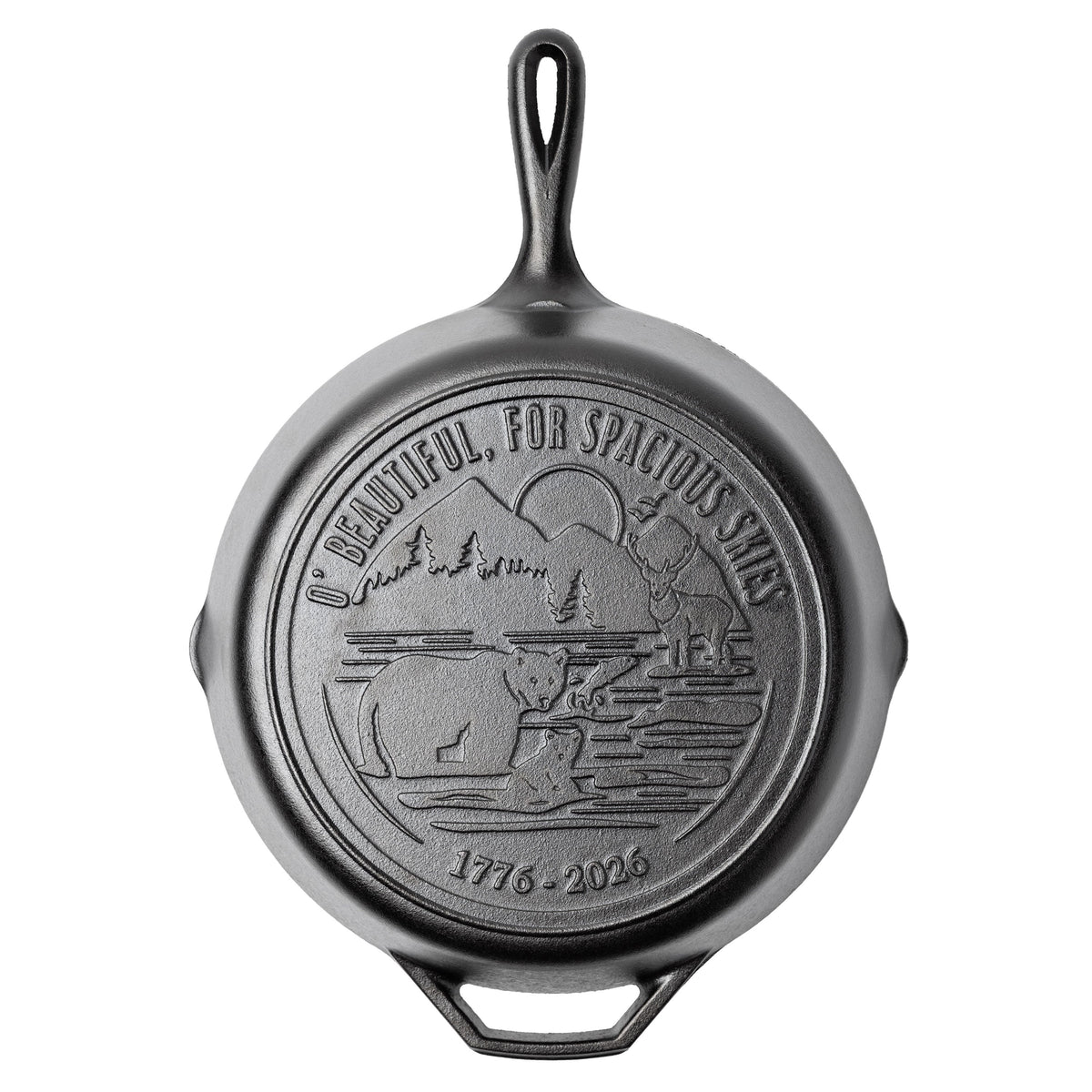 Cast iron skillet with back engraved featuring lyrics and imagery from America The Beautiful.