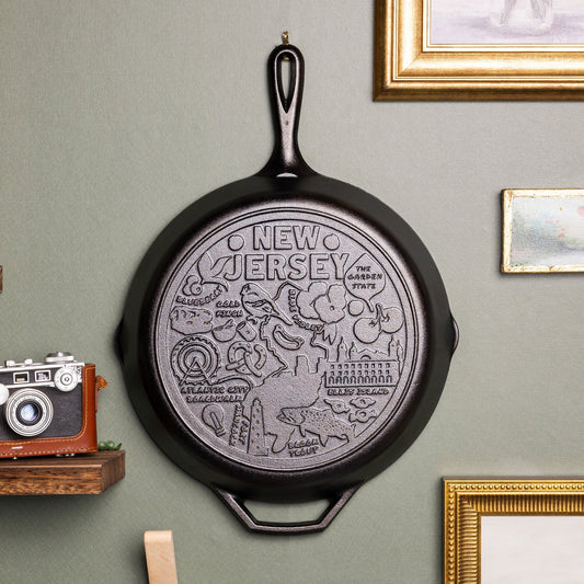 Decorative state cast iron skillet displayed on wall.