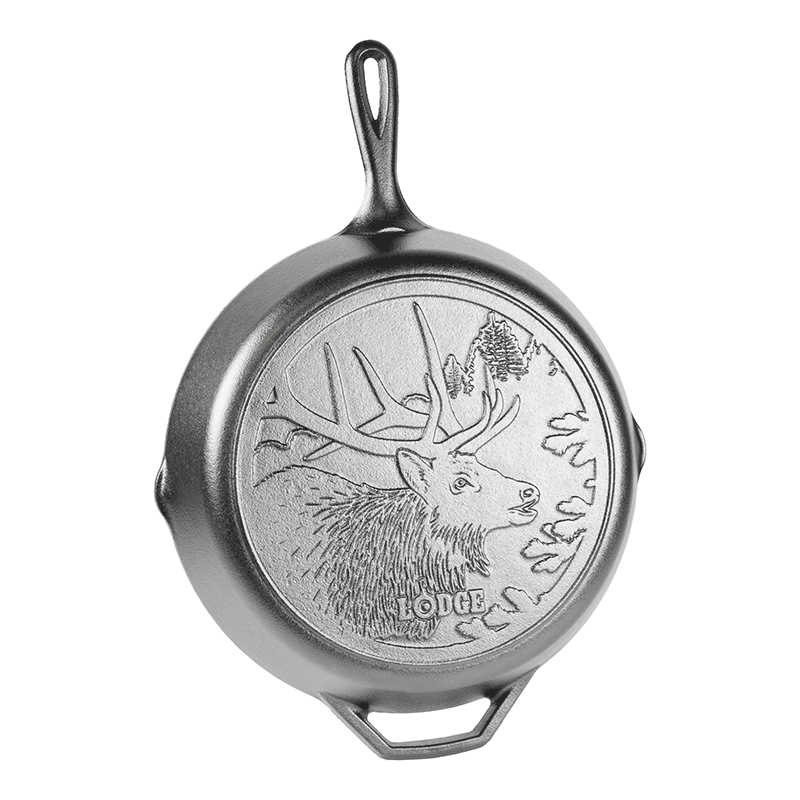 Skillet with engraved elk on back.
