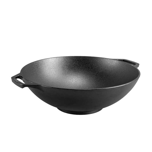 A black seasoned cast iron wok with 2 side handles.
