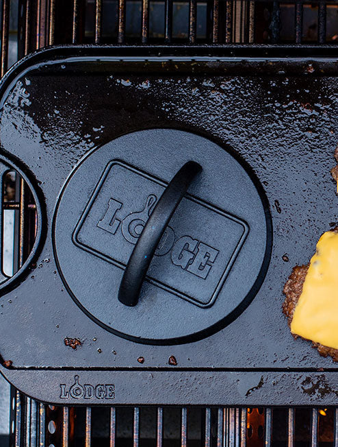 Press being used on griddle.