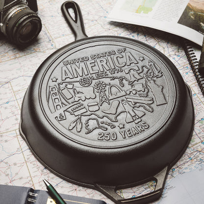 Close up view of engraved design on map background.