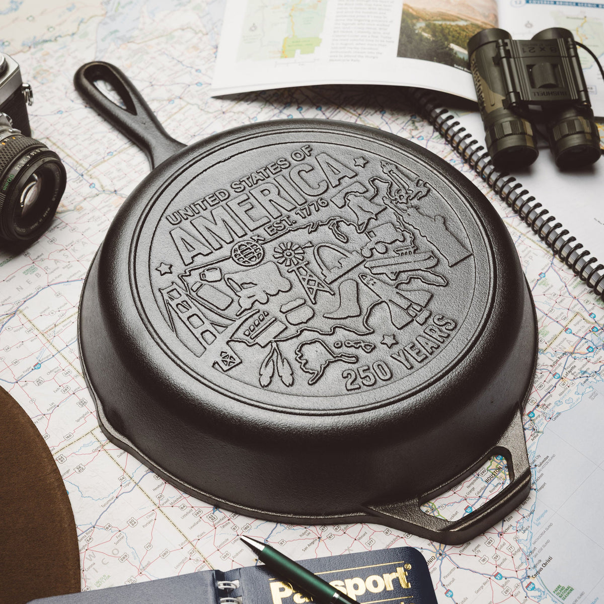 Cast iron skillet with 'United States of America 250 Years' design on a map background