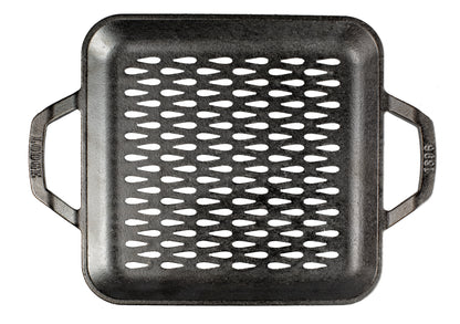 Top view of square shaped pan, with rounded corners and tear-drop shaped perforations.