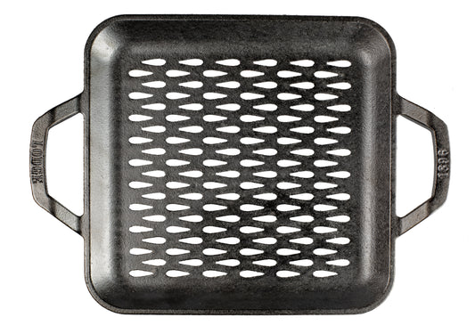 Top view of square shaped pan, with rounded corners and tear-drop shaped perforations.