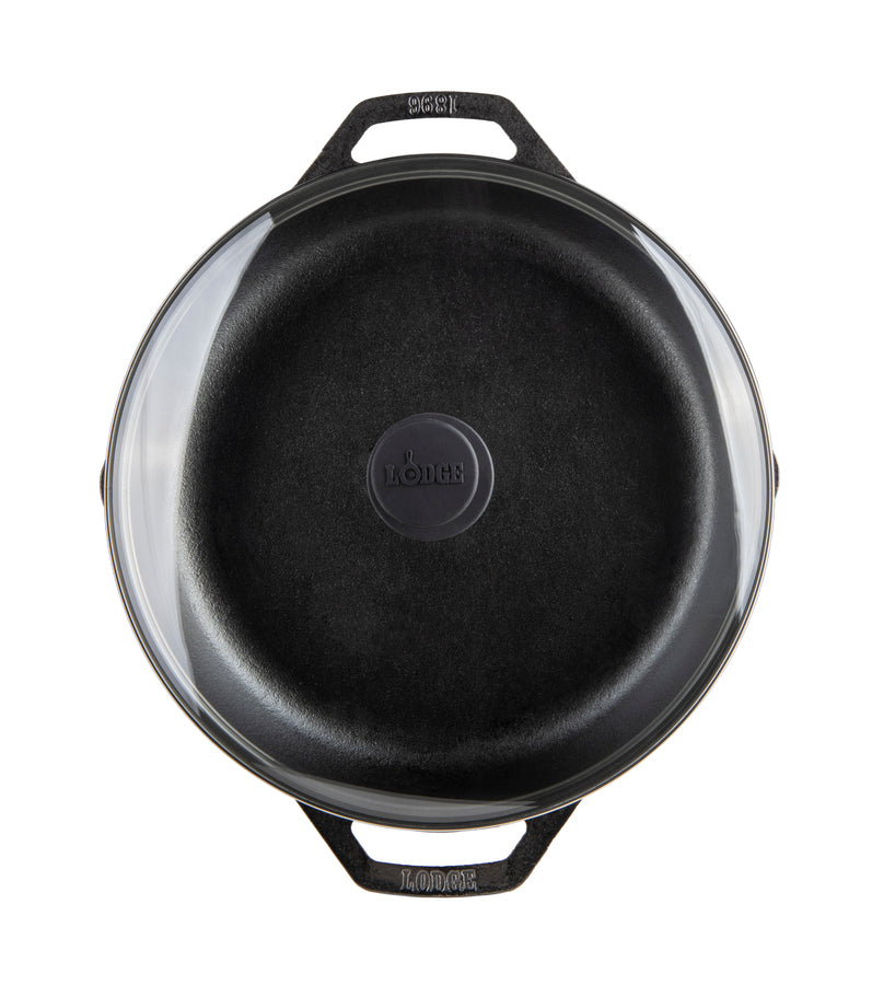 Top view of pan and lid featuring black handle knob in center of lid.