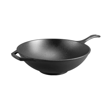 Cast iron wok with a long handle and a loop handle.