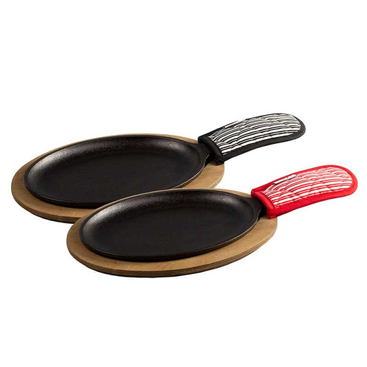 Two small oval pans with wooden bases and fabric striped handle holders.