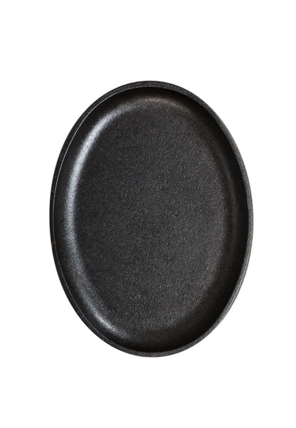 Top view of griddle, featuring cooking surface and raised edges.