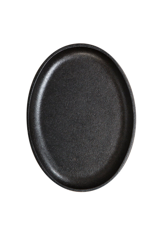 Top view of griddle, featuring cooking surface and raised edges.
