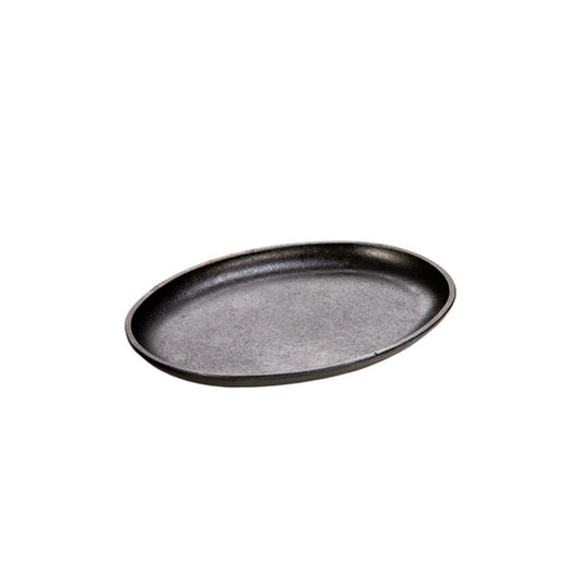An oval-shaped, black-colored serving griddle with no handles.