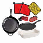 Set of cast iron and stoneware cookware with potholders, a scrubber, fabric handle holders, and pan scrapers.