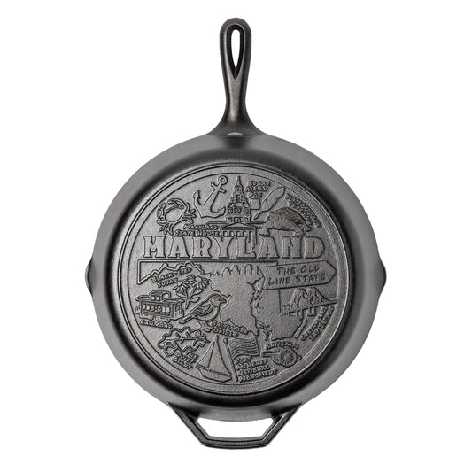 Cast iron skillet with the bottom engraved with beloved icons and monuments from Maryland.