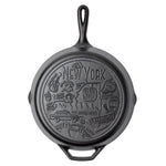 Cast iron skillet with the bottom engraved with beloved icons and monuments from New York.